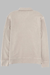 Beige cotton polo shirt with ribbed collar and cuffs featuring subtle textured weave from C.P. Company men’s collection