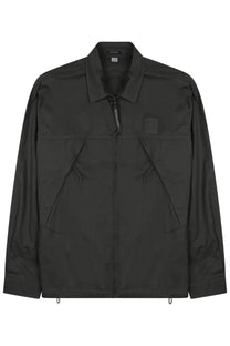 Black c.p. company men’s giacca metropolis overshirt in grey featuring durable fabric and a sleek urban design