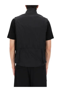 C P Company men’s black short-sleeved gilet with structured collar and two side pockets in durable fabric