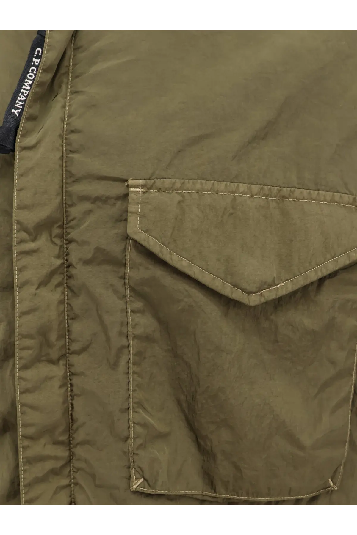 C.P. Company men’s olive green nylon quilted shirt jacket with diagonal flap pocket and matching stitching