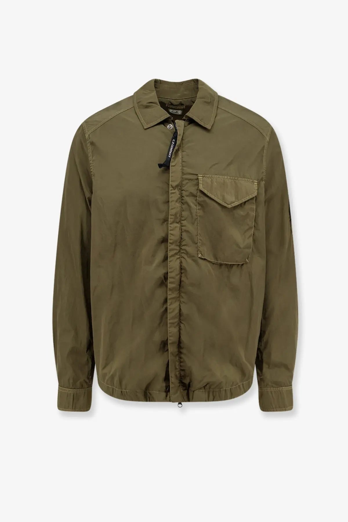 Olive green nylon utility shirt jacket by c.p. company with buttoned collar chest pocket and zipper closure