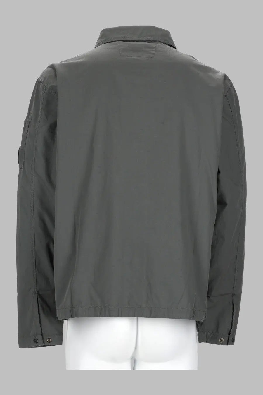 Dark gray c.p. company men’s overshirt with structured collar and buttoned cuffs in durable utility fabric