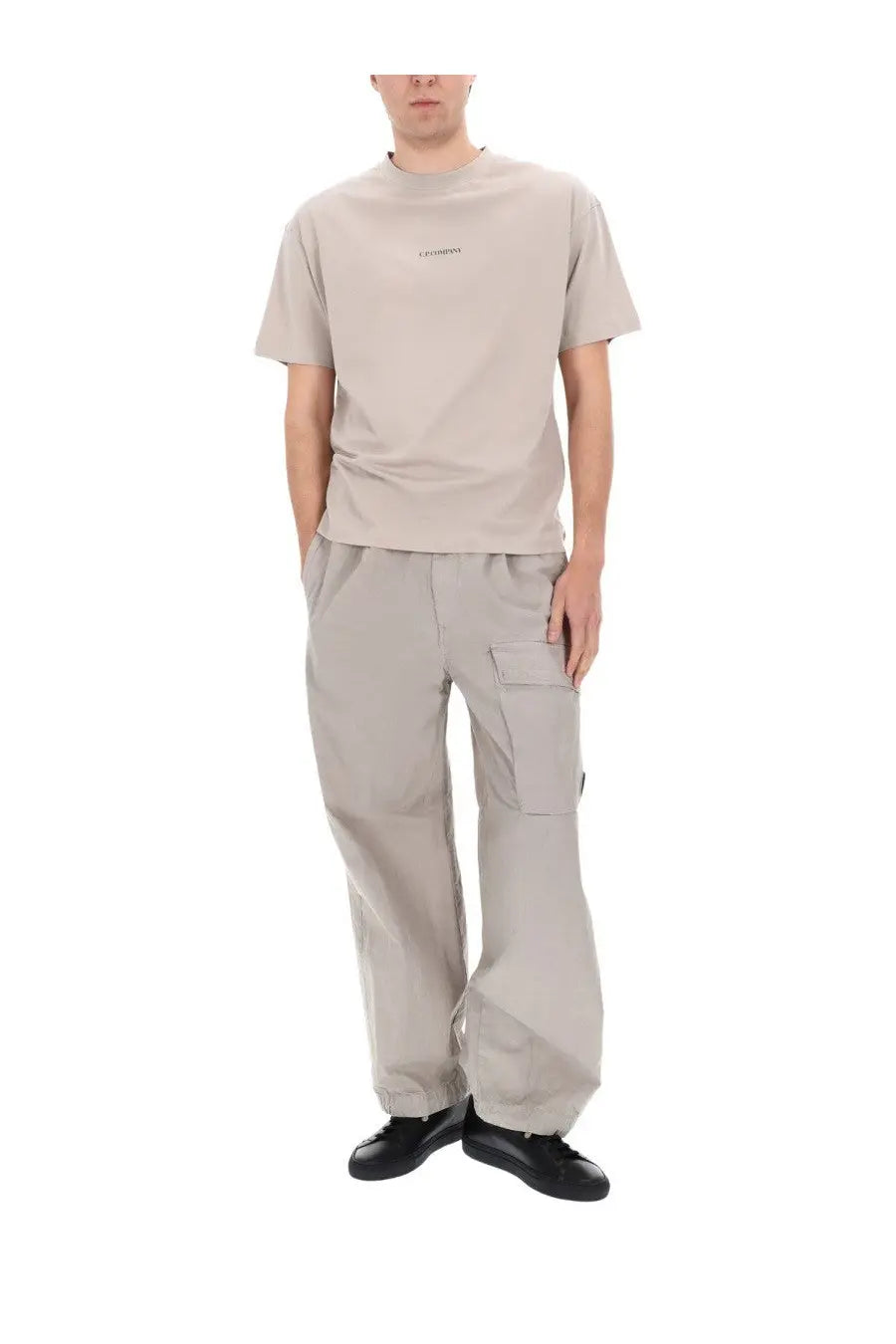 Beige cotton t-shirt with subtle embroidered logo on chest from c.p. company men’s pantalone cargo con patch beige collection