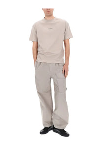 Beige cotton t-shirt with subtle embroidered logo on chest from c.p. company men’s pantalone cargo con patch beige collection