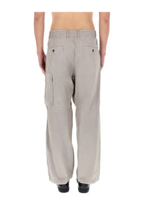 Beige C.P. Company men’s pantalone cargo pants with side pockets and button closures for casual wear