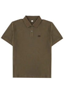 Olive green short-sleeved polo shirt by c.p. company with subtle textured fabric and small dark logo on left chest