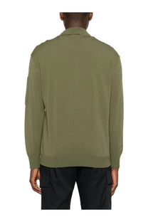 Olive green c.p. company men’s wool polo jacket with long sleeves collar and subtle seam detailing