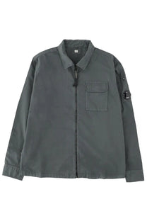 Dark gray long-sleeved utility jacket with front zipper and chest pocket in C.P. Company men’s zippered overshirt grey