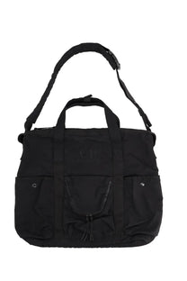 Black c.p. company unisex borsa tote bag in durable twill fabric shown from the back side