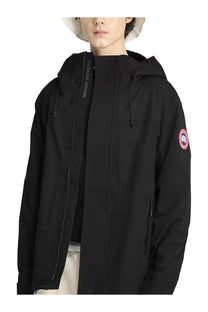 Canada Goose men’s rain jacket rupert black with hood and red and white logo patch on the sleeve