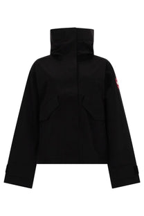 Canada Goose women’s Tofino black jacket with high collar and red logo patch on the sleeve in down material
