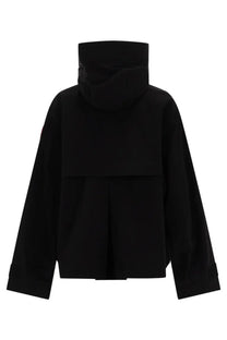 Canada Goose Women’s Tofino black hooded jacket with structured minimalist design and long sleeves for cold weather