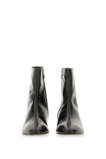 Carel Paris women’s black leather ankle boots with sleek minimalist design and inner side visible zippers