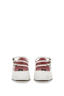 Carel Paris women’s Ariana white patent leather mary jane flats with silver buckle straps and pink insole