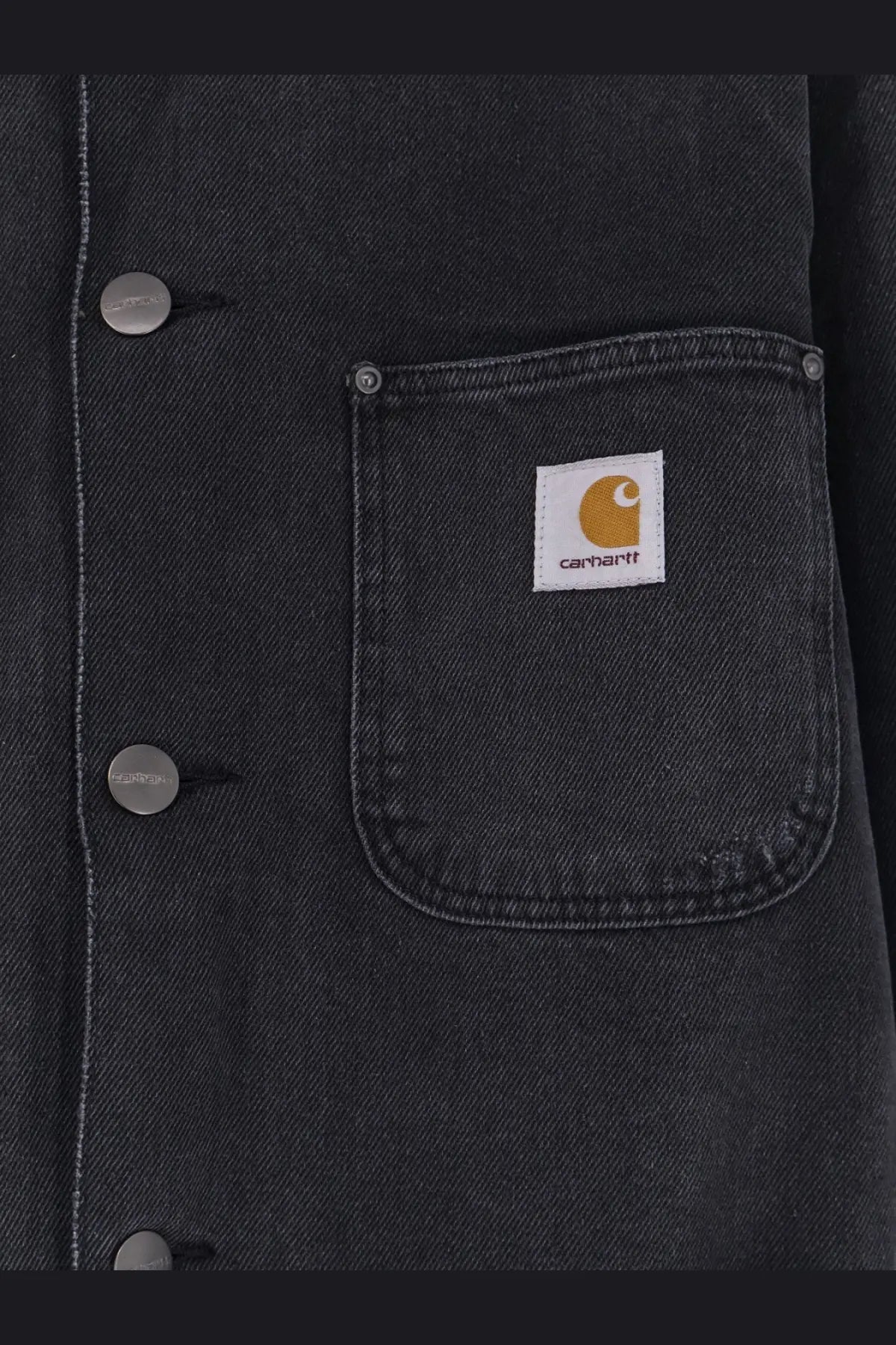 Carhartt Wip men’s Aden black denim jacket in dark gray with a white patch and orange logo on the chest pocket