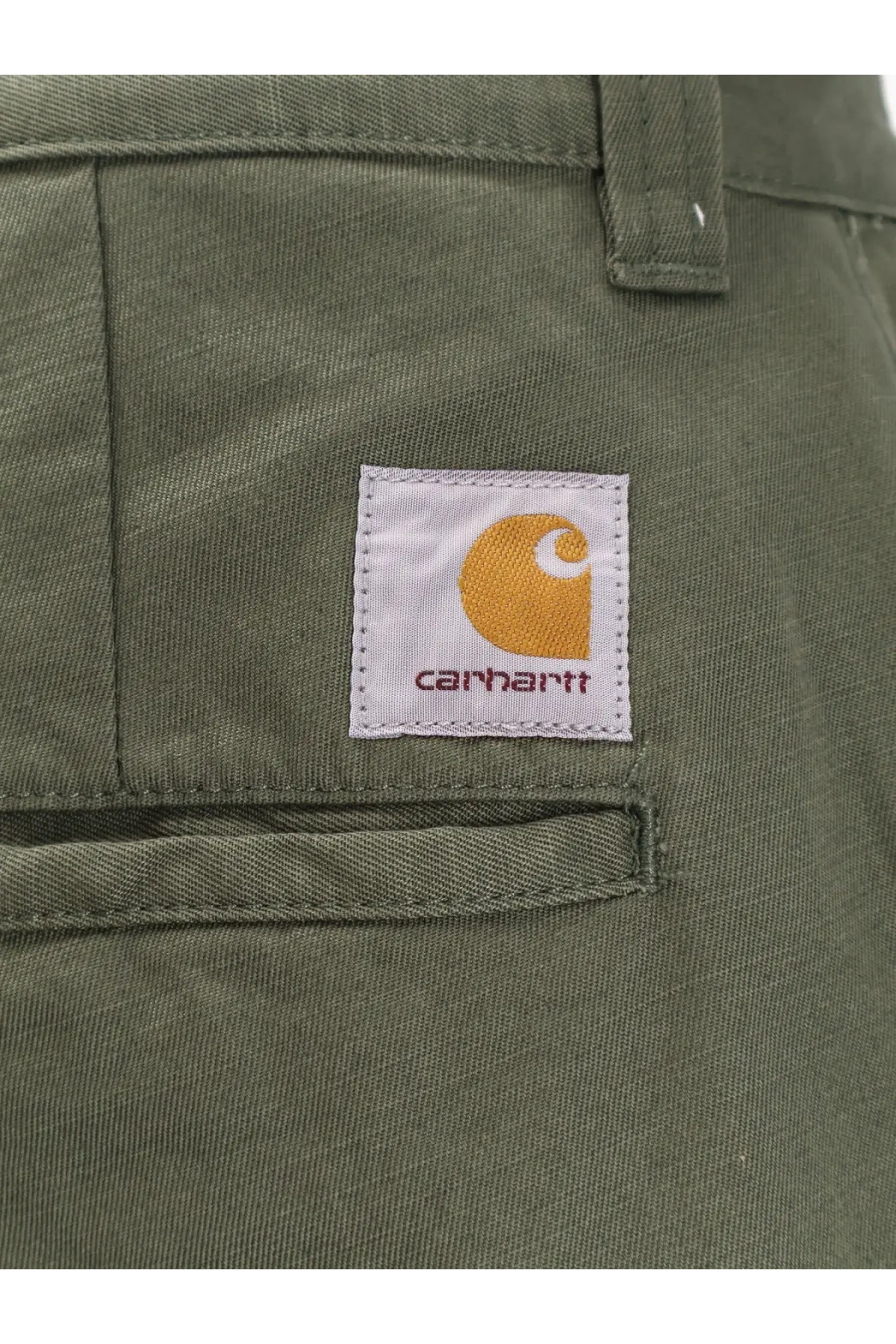 Olive green carhartt wip men’s brady cotton cargo trousers with white label and orange logo stitching detail