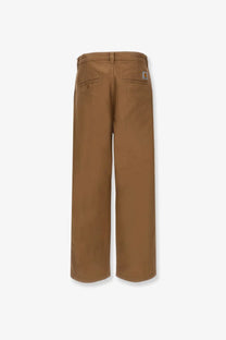 Tan carhartt wip men’s bready cotton trousers beige shown from the back with classic twill fabric and rear patch pockets