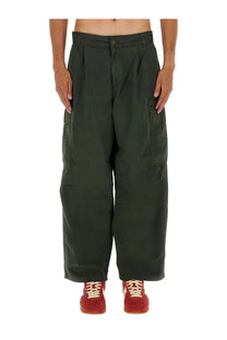 Carhartt wip men’s cargo pants in cole green dark olive with wide legs and multiple functional pockets