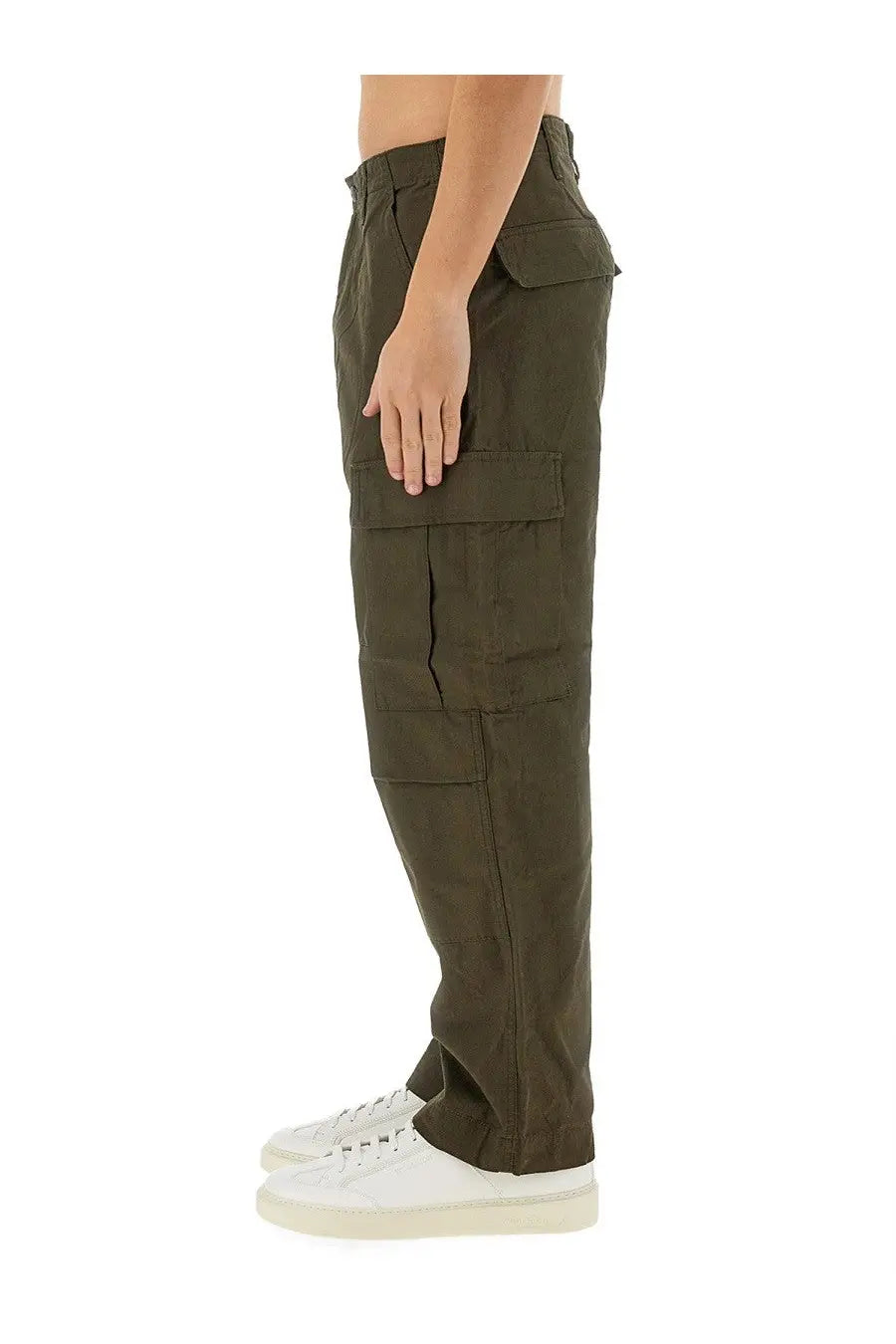 Olive green Carhartt Wip men’s cargo pants with multiple flap pockets and a relaxed fit made from durable material