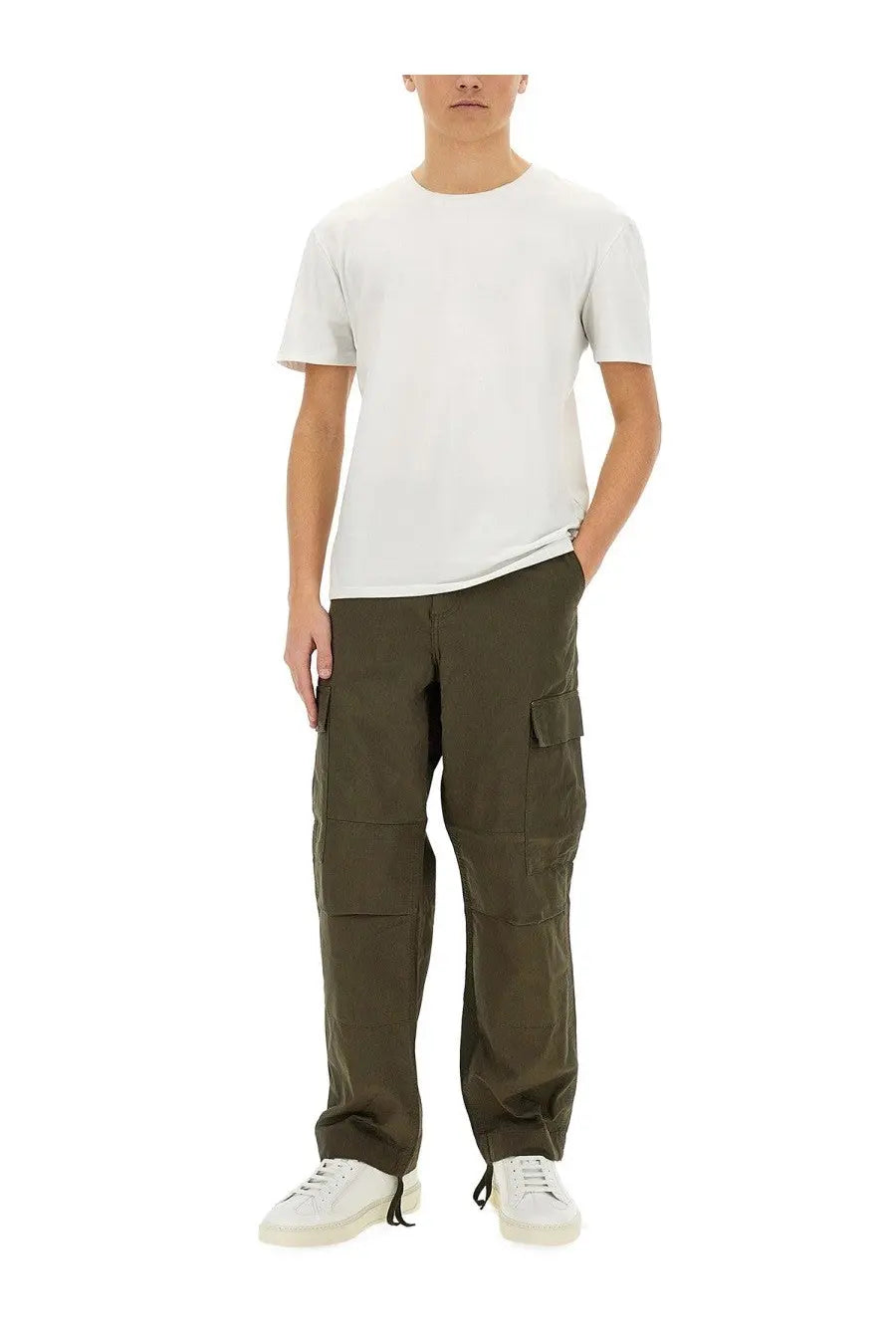Carhartt Wip men’s olive green cargo pants with multiple pockets and relaxed fit made from durable material