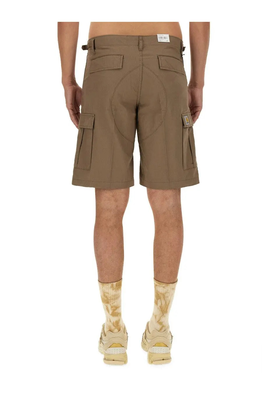 Carhartt Wip men’s beige cotton bermuda shorts with multiple cargo pockets and a brand patch on the thigh