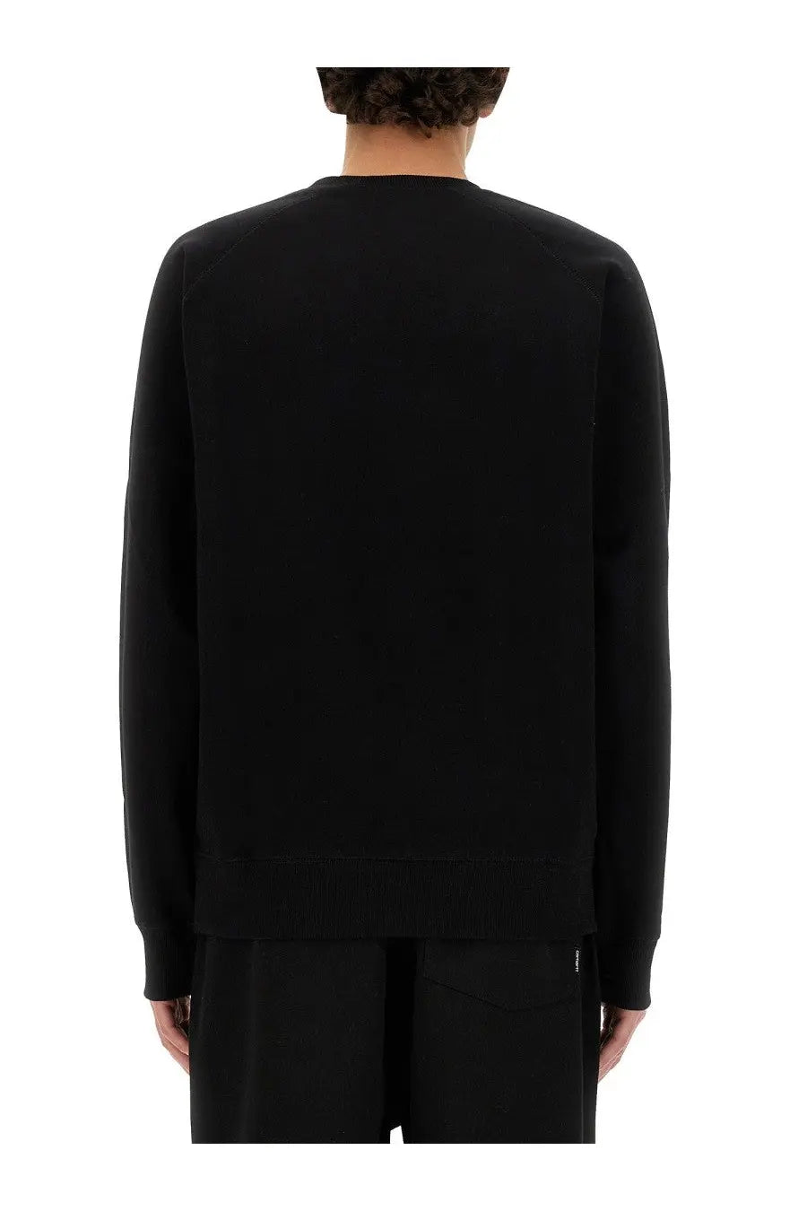 Carhartt Wip men’s black cotton long-sleeved crewneck sweatshirt with ribbed cuffs and hem