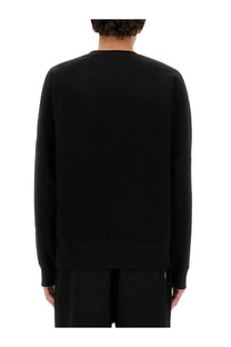 Carhartt Wip men’s black cotton long-sleeved crewneck sweatshirt with ribbed cuffs and hem