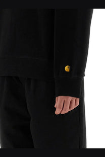 Carhartt Wip men’s black cotton chase sweatshirt with small yellow embroidered logo on the sleeve