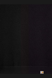 Black mesh fabric with subtle texture and carhartt logo patch on bottom right of carhartt wip men’s cotton sweatshirt