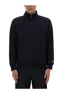 Black carhartt wip men’s half-zip fleece sweatshirt with yellow logo on sleeve and blue details