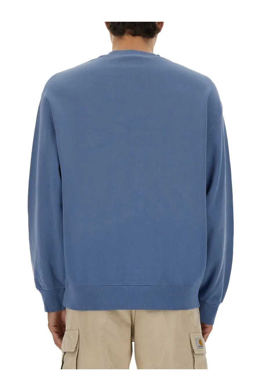 Carhartt Wip men’s jersey sweatshirt in Hudson blue with ribbed cuffs and hem made from durable fabric