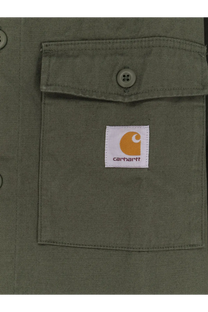 Carhartt Wip men’s kelly cotton shirt in olive green with buttoned chest pocket and orange logo patch