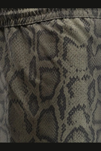 Carhartt Wip men’s nylon swim boxer shorts in olive green and black snake print fabric front view