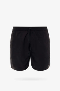 Carhartt Wip men’s black nylon swim trunk with drawstring waistband and subtle side seam detailing
