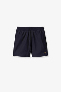 Dark navy carhartt wip men’s nylon swim trunks with a gold-toned logo on the lower right leg for swimming