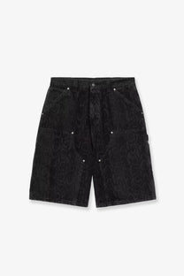 Carhartt Wip men’s black denim bermuda shorts with subtle snakeskin pattern and silver rivets on the pockets