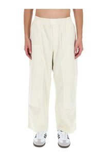 Carhartt wip men’s cream-colored wide-leg trousers with relaxed fit and large patch pockets in crawton white
