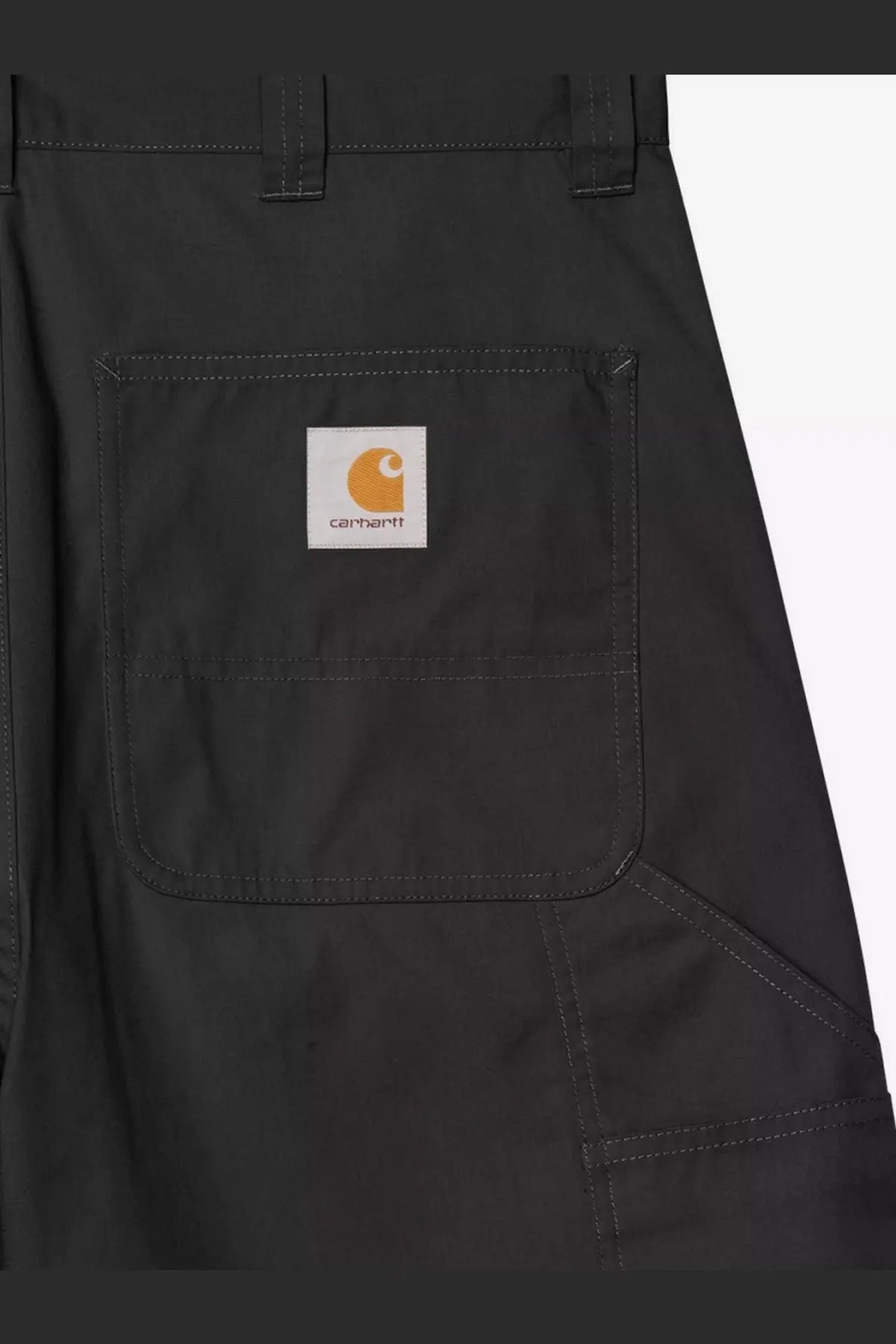 Black carhartt wip men’s postal dk cotton blend bermuda shorts featuring a white label with orange logo on front pocket