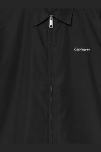 Black carhartt wip men’s postal shirt with silver zipper and subtle white embroidered logo on the chest