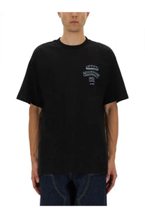 Black Carhartt Wip men’s sandwich shirt in cotton featuring a white embroidered logo on the chest