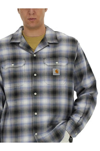 Carhartt wip men’s long-sleeve button-up shirt in gray black and white plaid with logo patch on left chest