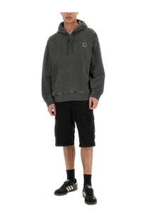 Dark gray carhartt wip men’s hoodie with small chest logo patch paired with short black cargo pants