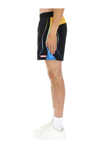 Casablanca men’s football windbreaker shorts black with bold yellow and blue diagonal stripes sporty design