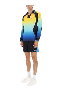 Casablanca men’s football windbreaker shorts black paired with vibrant gradient long-sleeve polo shirt with black trim