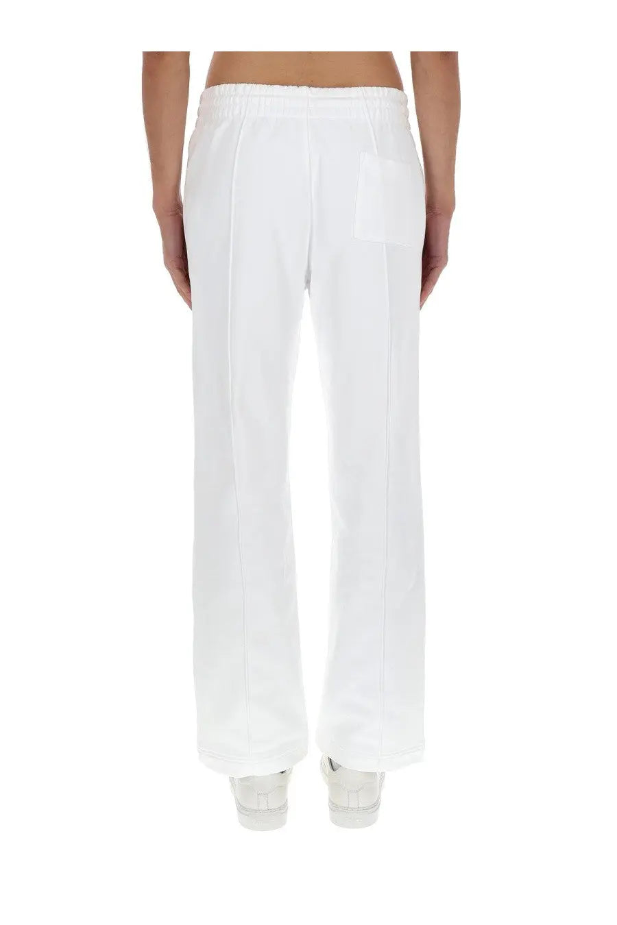 White wide-leg trousers with relaxed fit and elastic waistband from casablanca men’s jogger pants tennis club icon white collection
