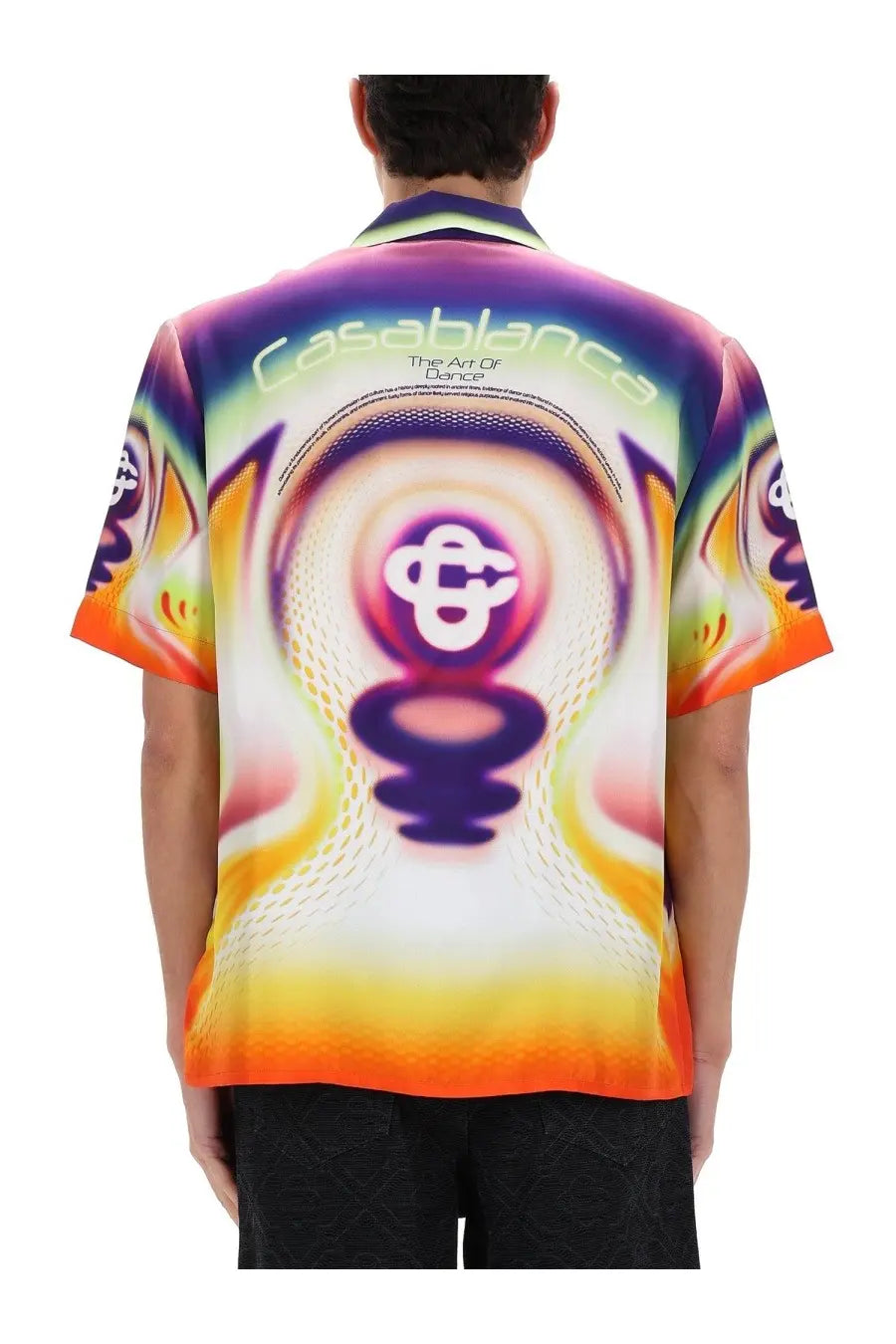 Back view of casablanca men’s printed shirt multicolor with psychedelic swirl design and white text on short sleeves