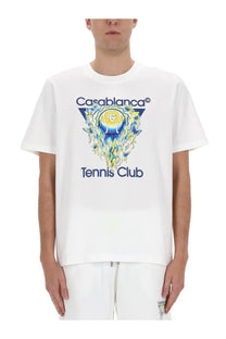 White cotton Casablanca men’s t-shirt with vibrant tennis ball graphic and blue yellow flames design