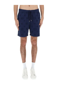 Casablanca men’s navy blue shorts with elastic waistband and repeating circular logo pattern for casual wear