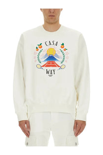 Cream-colored cotton Casablanca men’s sweatshirt with vibrant mount fuji graphic tennis rackets and oranges design