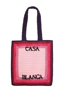 Handcrafted pink and navy blue crocheted Casablanca men’s tote bag with black embroidered casa blanca lettering